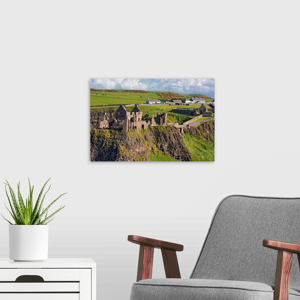A modern room featuring Dunluce Castle, Bushmills, Northern Ireland - Aerial Photograph