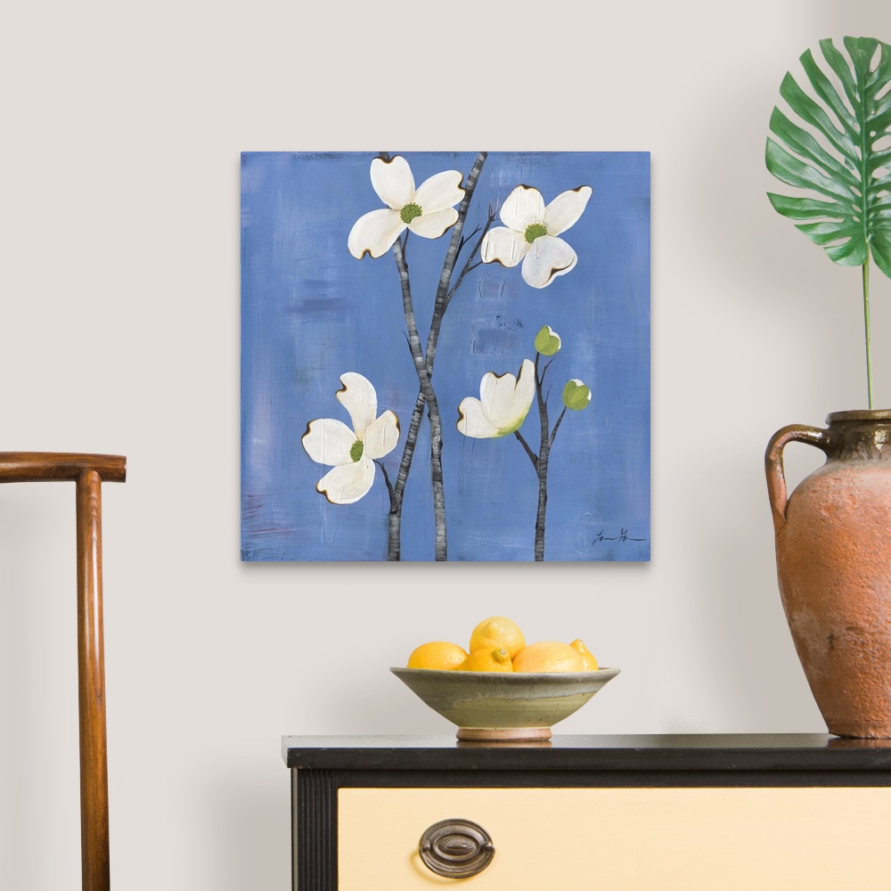 A traditional room featuring Contemporary painting of dogwood flowers against a blue background.