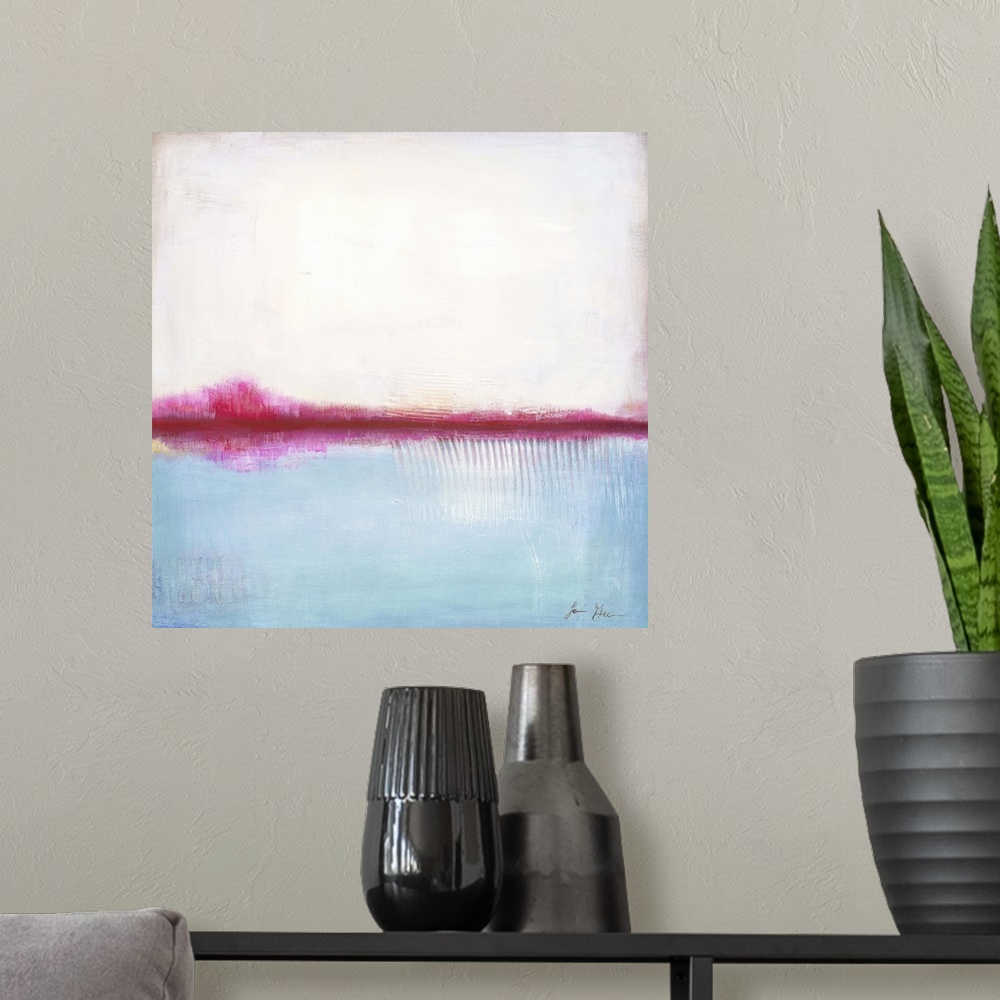 A modern room featuring Square, abstract painting featuring large blocks of color in white and light blue with pink accents