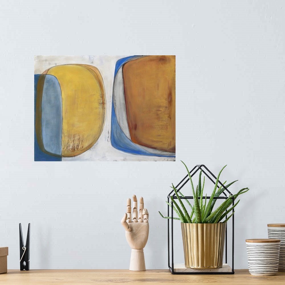 A bohemian room featuring Retro mid-century inspired contemporary abstract painting using muted orange and yellows.