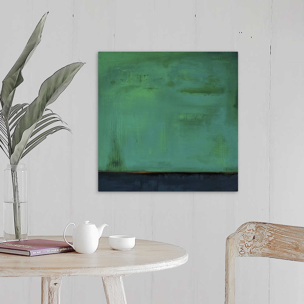 A farmhouse room featuring Square, abstract painting featuring large blocks of color in green and dark blue/gray