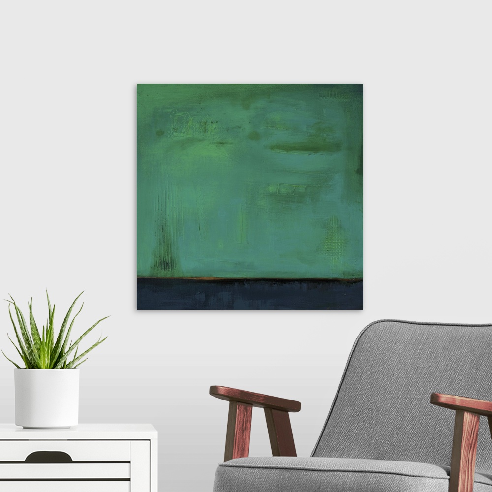 A modern room featuring Square, abstract painting featuring large blocks of color in green and dark blue/gray