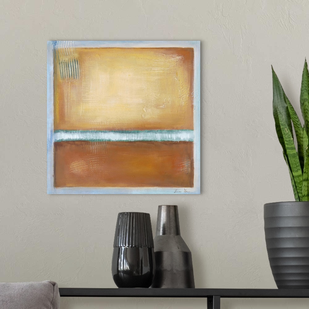 A modern room featuring Square, abstract painting featuring large blocks of color in tan with light blue accents
