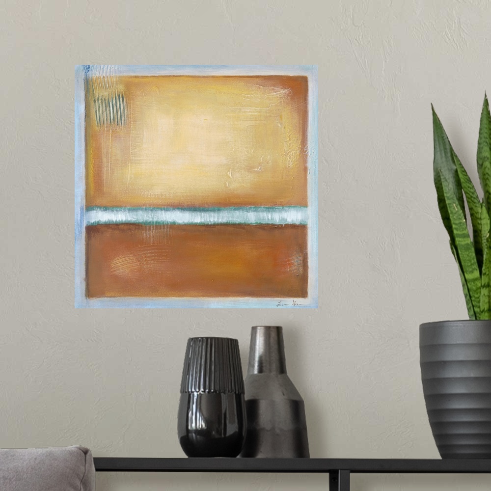 A modern room featuring Square, abstract painting featuring large blocks of color in tan with light blue accents