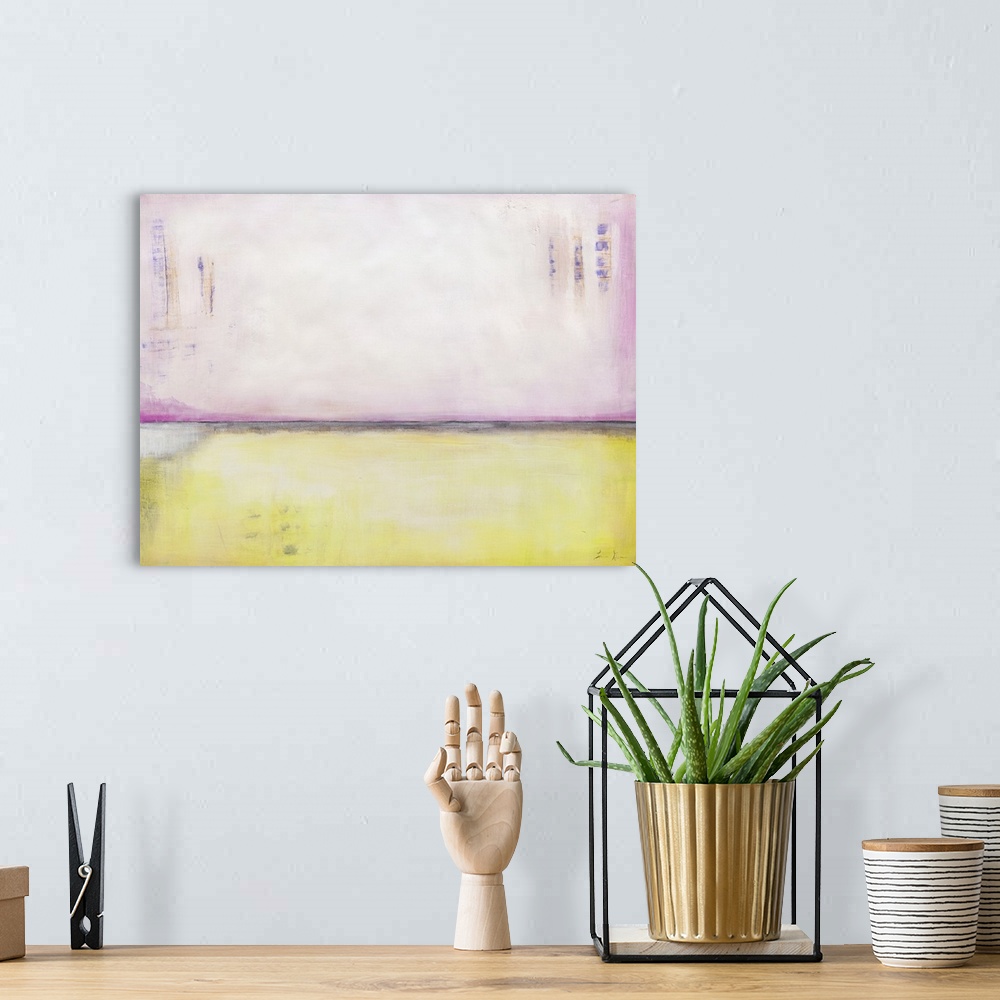 A bohemian room featuring Contemporary abstract colorfield painting using pale pastel pink and yellow.