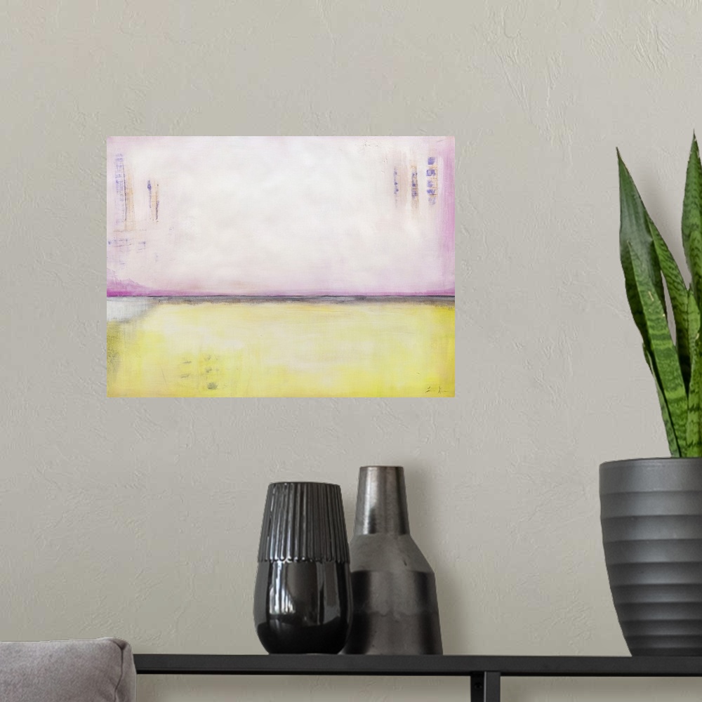 A modern room featuring Contemporary abstract colorfield painting using pale pastel pink and yellow.