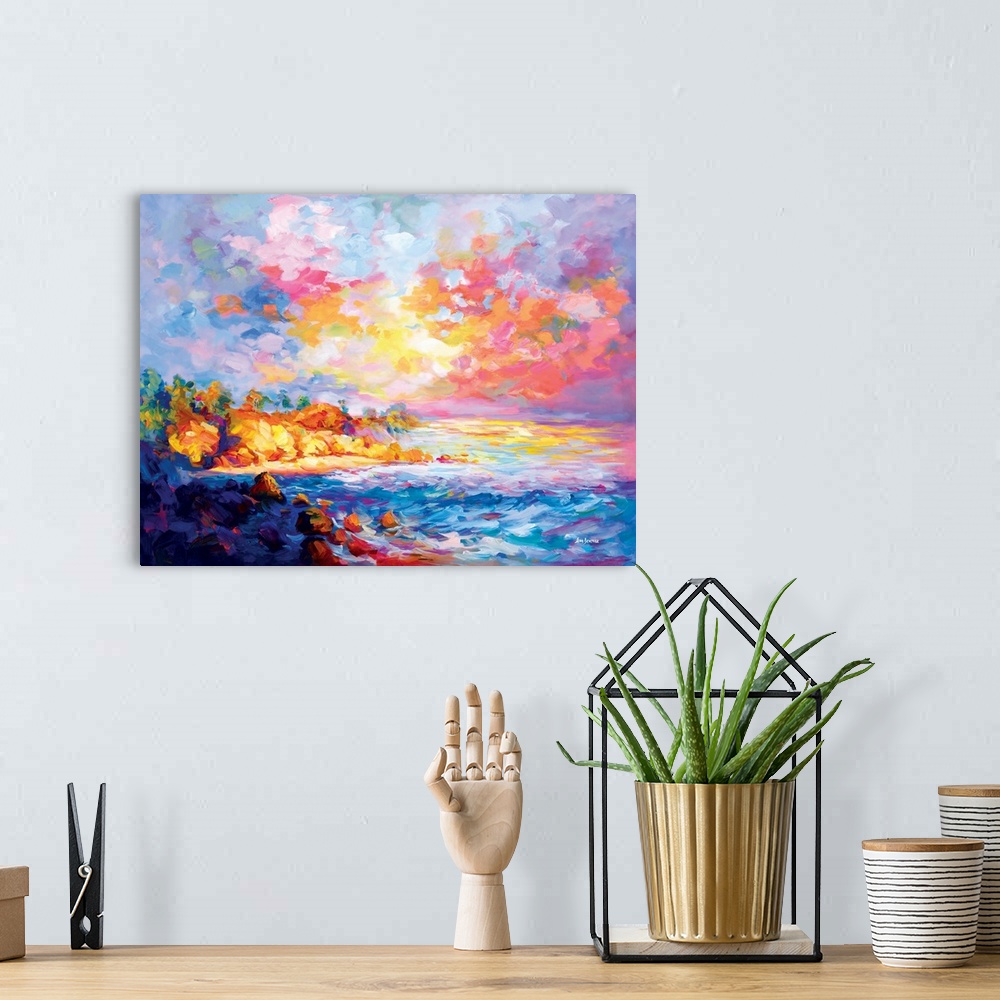 A bohemian room featuring Impressionist painting of a beautiful coast in Southern California.