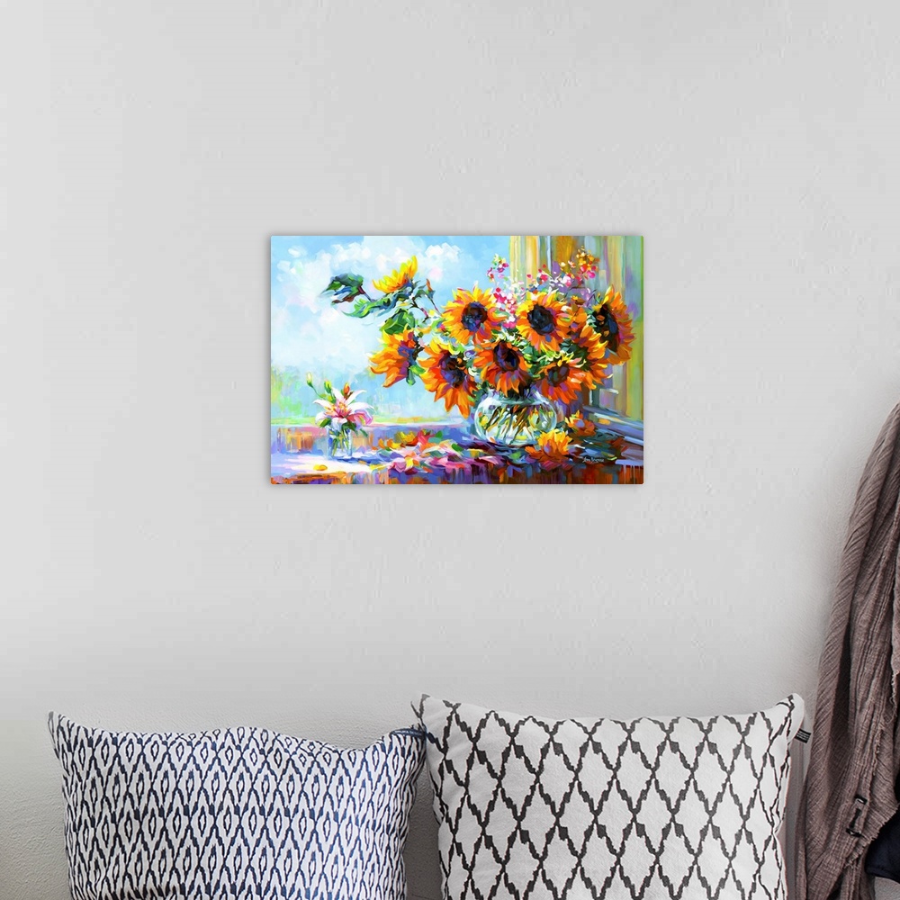 A bohemian room featuring This contemporary still life bursts with the energy of sunflowers in a vase, their fiery petals c...