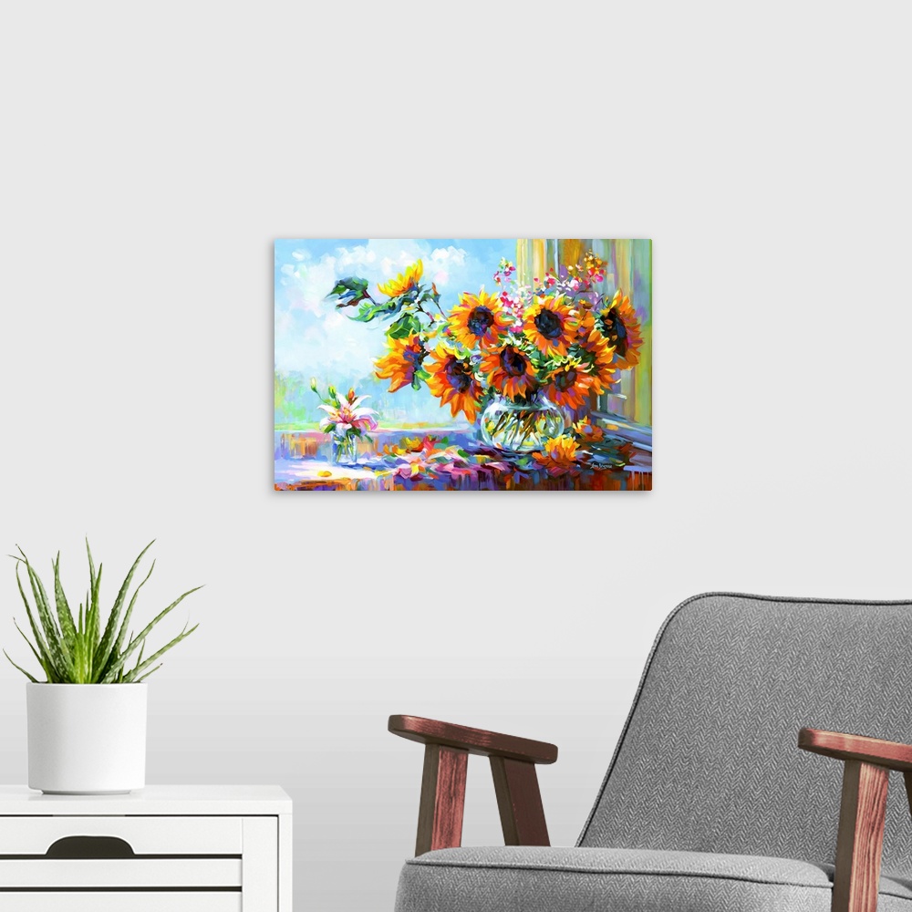 A modern room featuring This contemporary still life bursts with the energy of sunflowers in a vase, their fiery petals c...