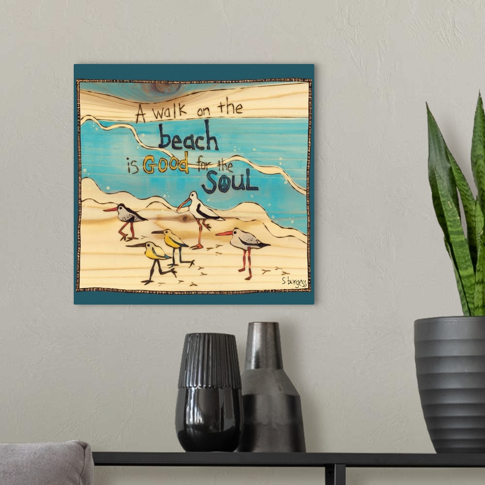 A modern room featuring Birds and seagulls on a beach with water and a saying