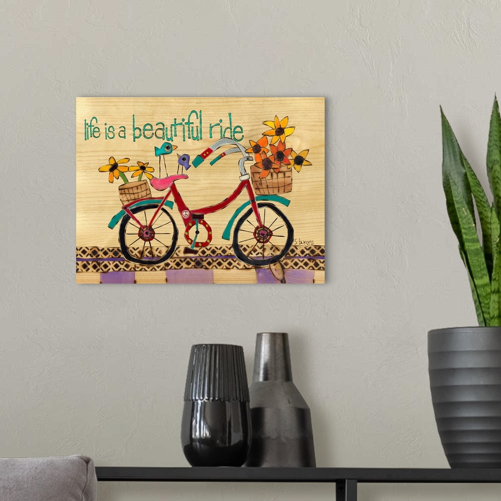 A modern room featuring Bike with basket full of flowers and saying