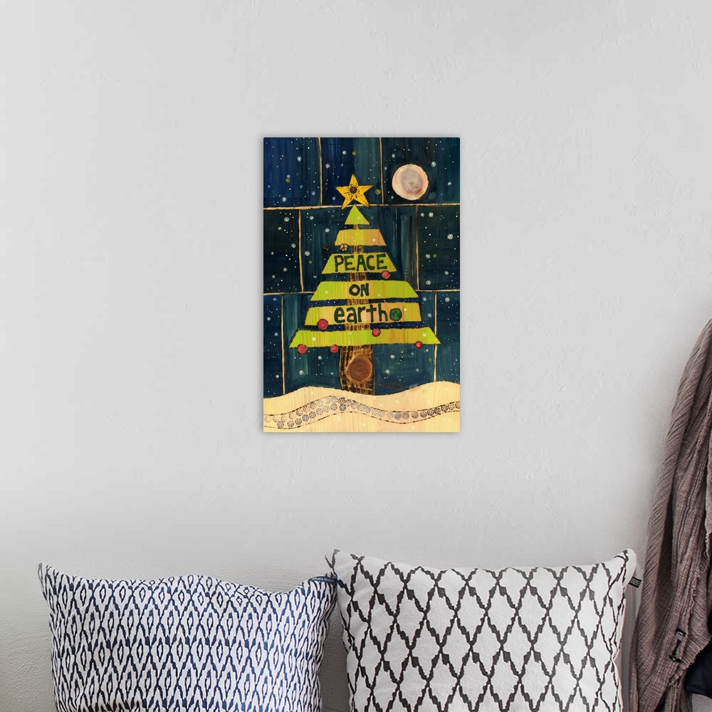 A bohemian room featuring Christmas tree with star in night scene
