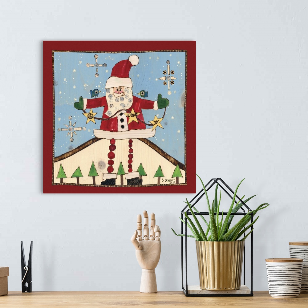 A bohemian room featuring Santa in snow scene with trrees and snowflakes