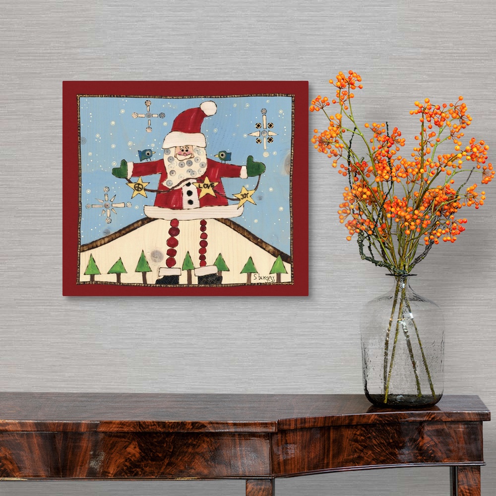 A traditional room featuring Santa in snow scene with trrees and snowflakes