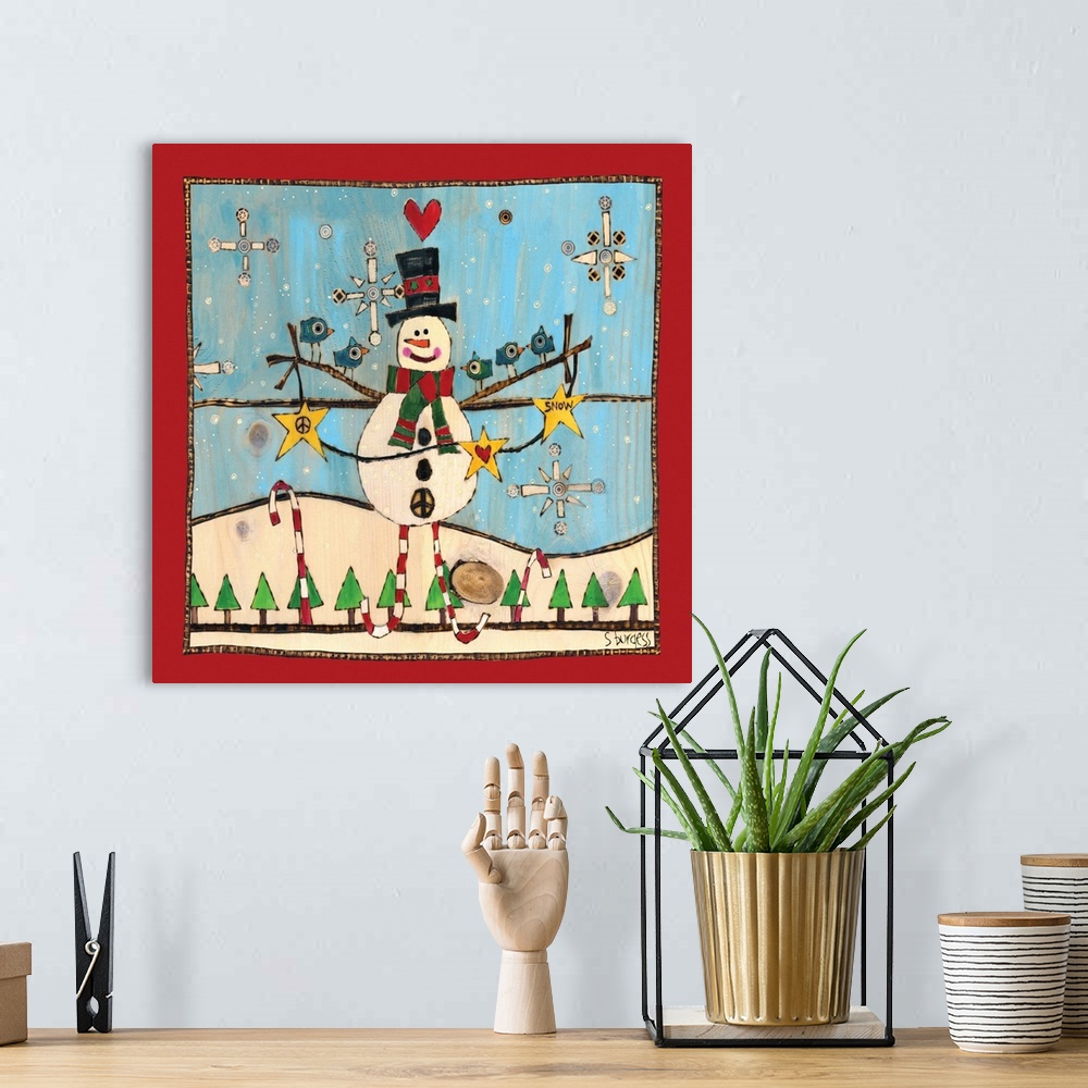 A bohemian room featuring Snowman with blue birds in snow scene