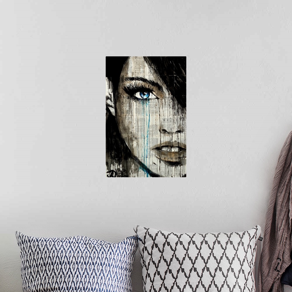 A bohemian room featuring Contemporary artwork of a close-up of a woman's face with deep blue eyes against a background of ...