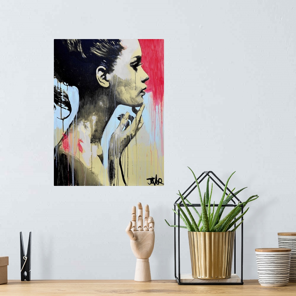 A bohemian room featuring Contemporary urban artwork of a woman in profile against a background of vibrant dripping paint.