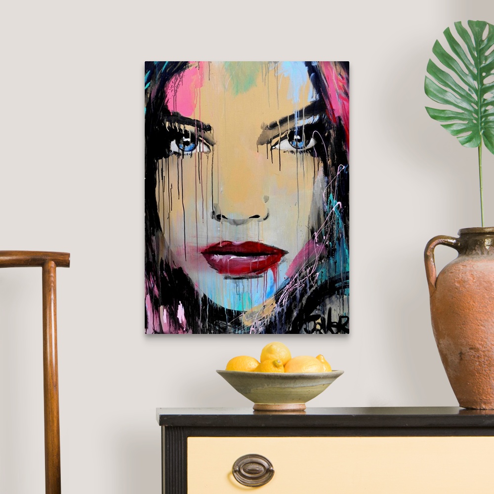 A traditional room featuring Contemporary urban artwork of a close-up of a woman's face with deep blue eyes against a backgrou...