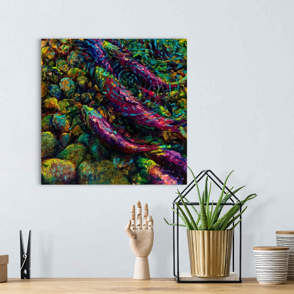 A bohemian room featuring Brightly colored contemporary artwork of sockeyes in water.