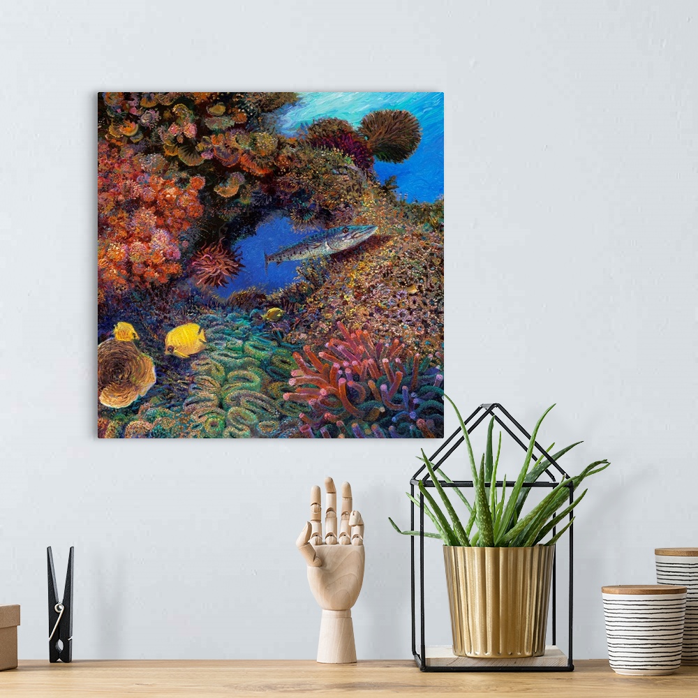 A bohemian room featuring Brightly colored contemporary artwork of a barracuda swimming through coral.