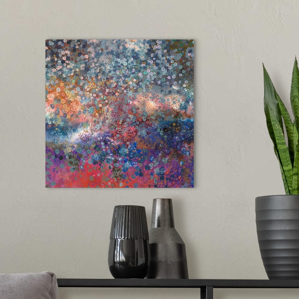 A modern room featuring Brightly colored contemporary artwork of a fingerpainting made with blues, pinks, and oranges.