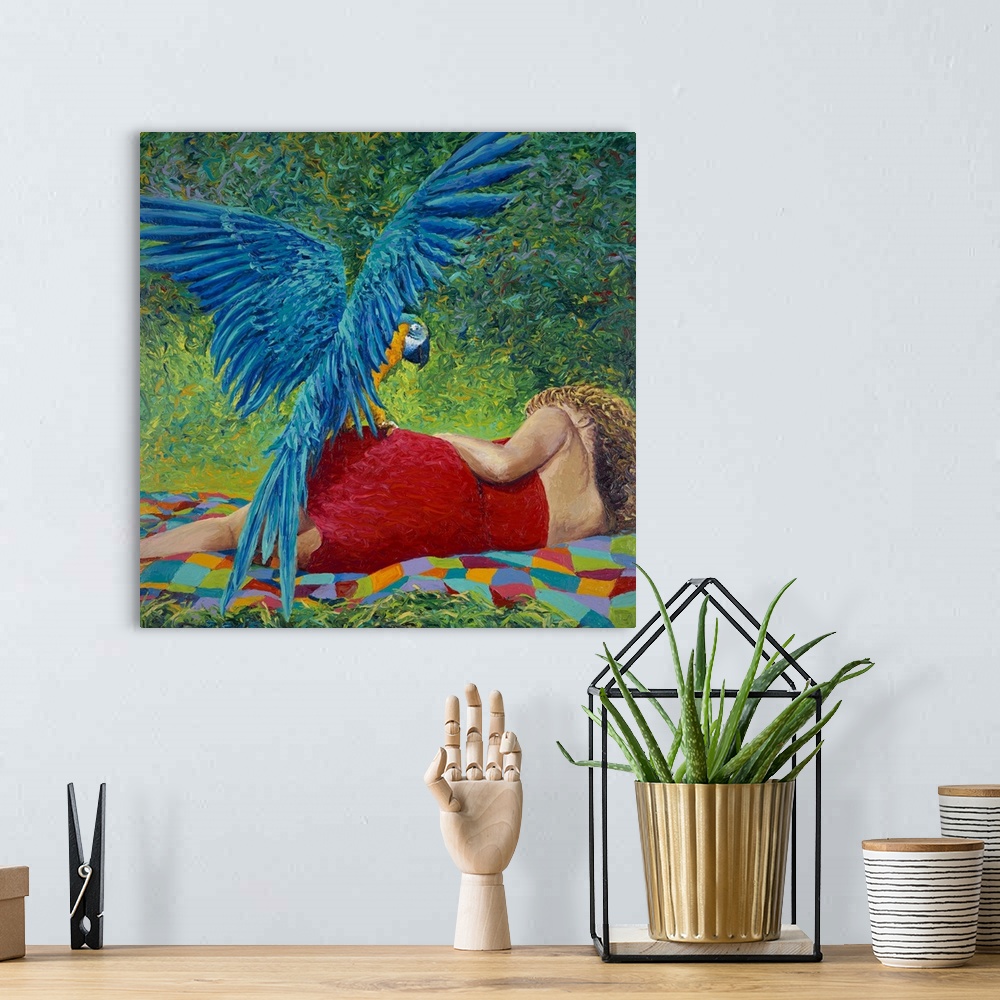 A bohemian room featuring Brightly colored contemporary artwork of a parrot resting on woman.