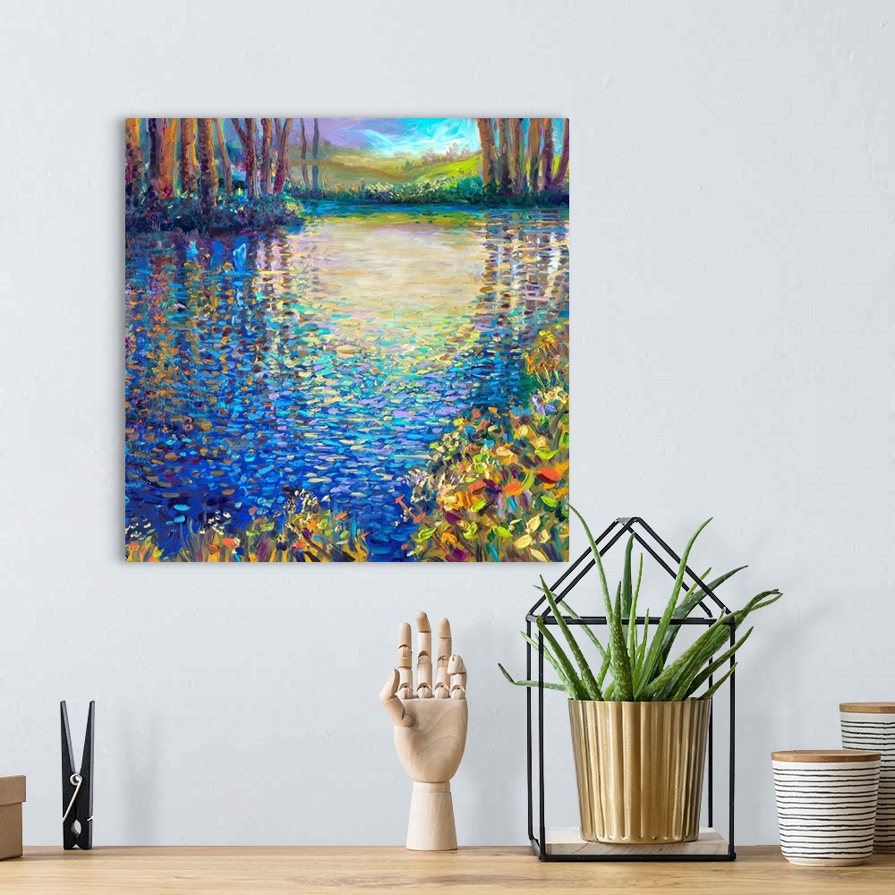 A bohemian room featuring Brightly colored contemporary artwork of a landscape with a pond.