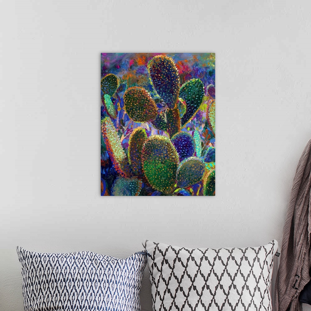 A bohemian room featuring Brightly colored contemporary artwork of a field of colorful cacti.