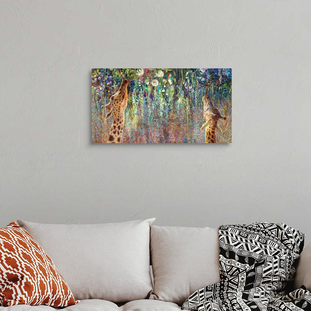 A bohemian room featuring Brightly colored contemporary artwork of two giraffes eating from hanging flowers.
