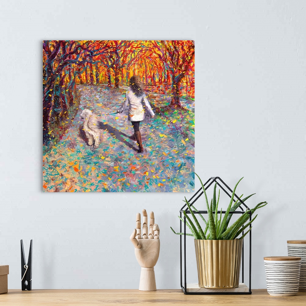 A bohemian room featuring Brightly colored contemporary artwork of a woman walking a dog.