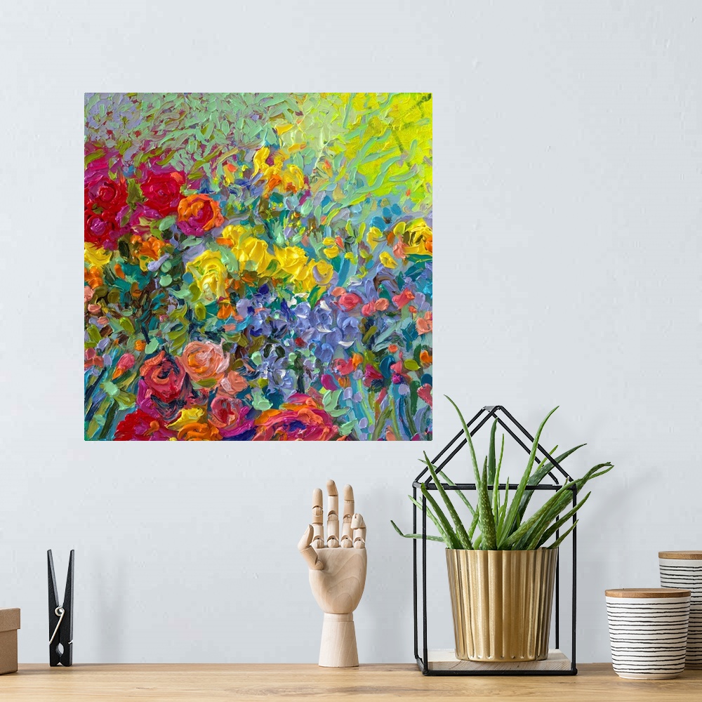 A bohemian room featuring Brightly colored contemporary artwork of a field of flowers.