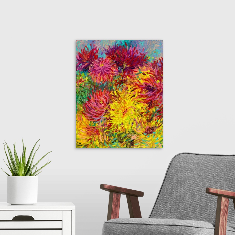 A modern room featuring Brightly colored contemporary artwork of red and yellow dahlias.