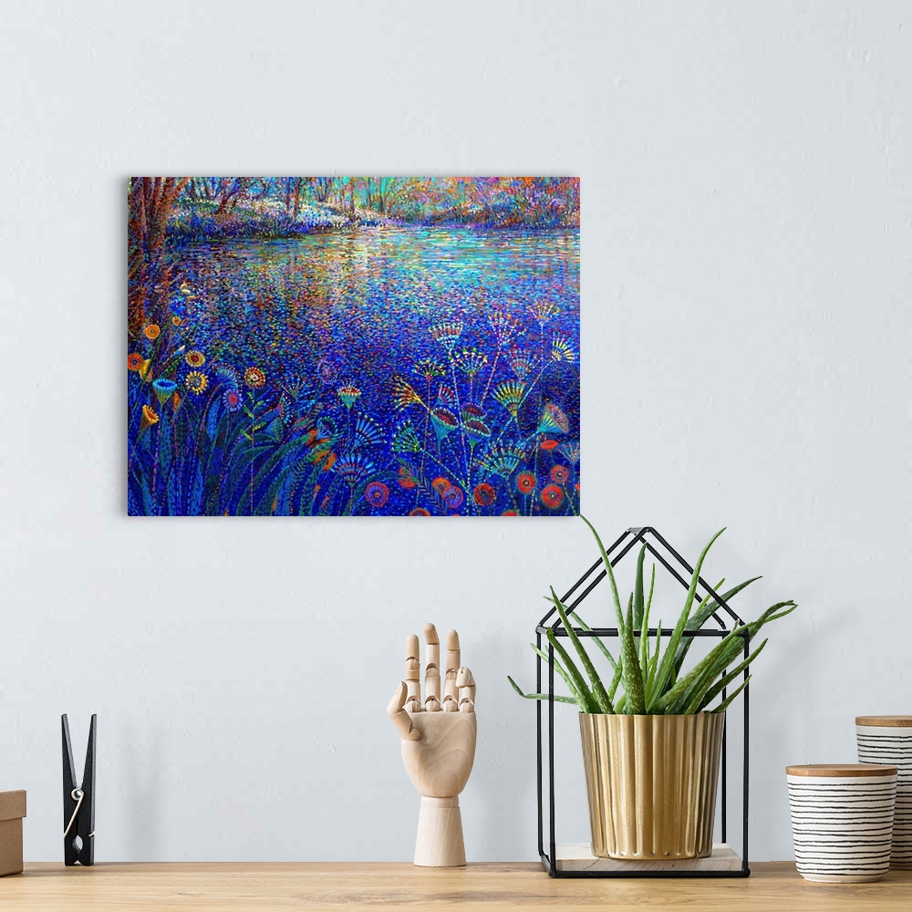 A bohemian room featuring Brightly colored contemporary artwork of flowers alongside a river bank.