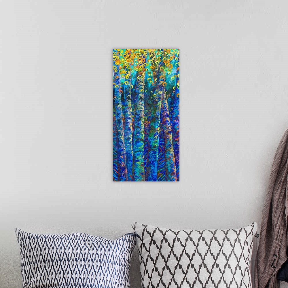 A bohemian room featuring Brightly colored contemporary artwork of colorful trees.