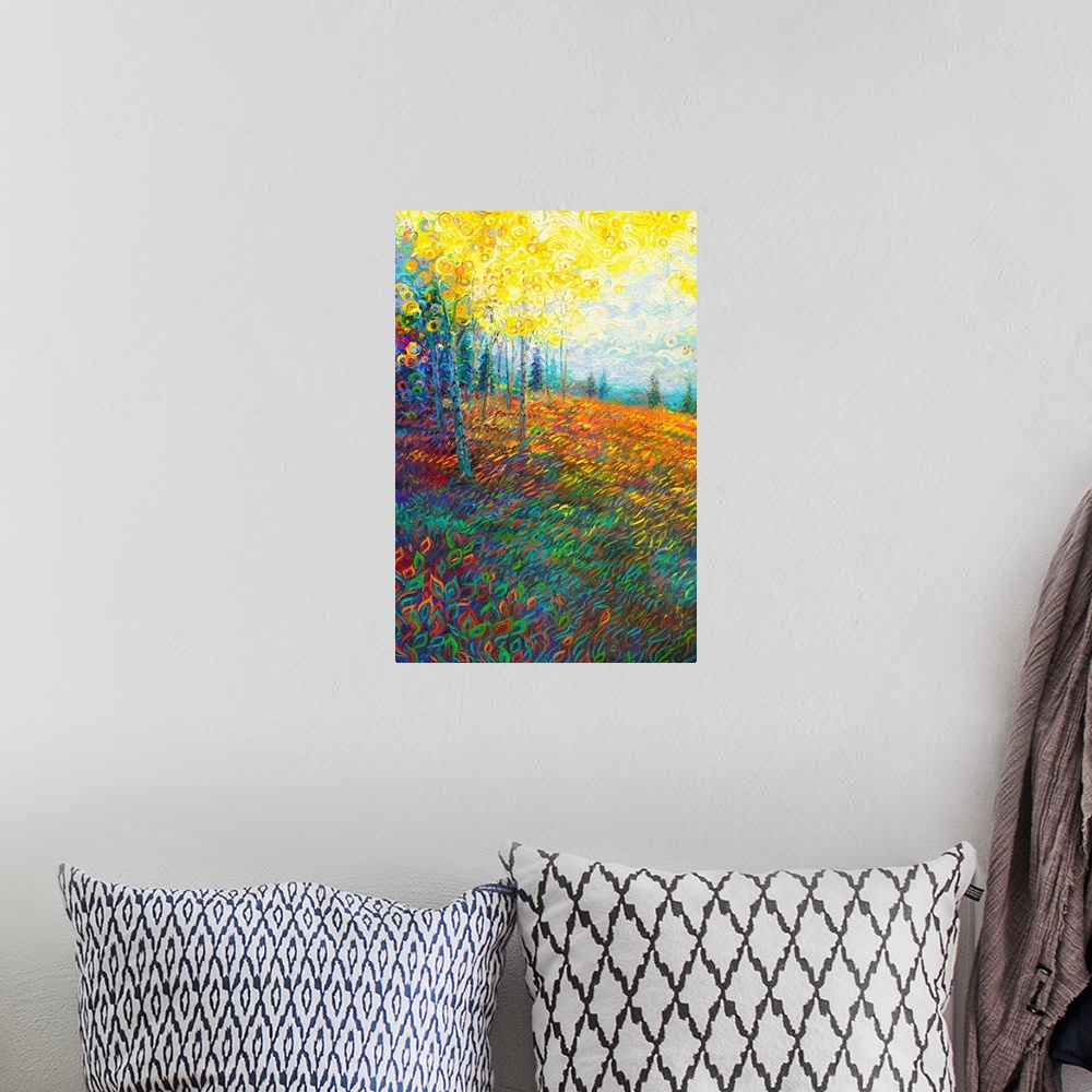 A bohemian room featuring Brightly colored contemporary artwork of a landscape of trees in a field.