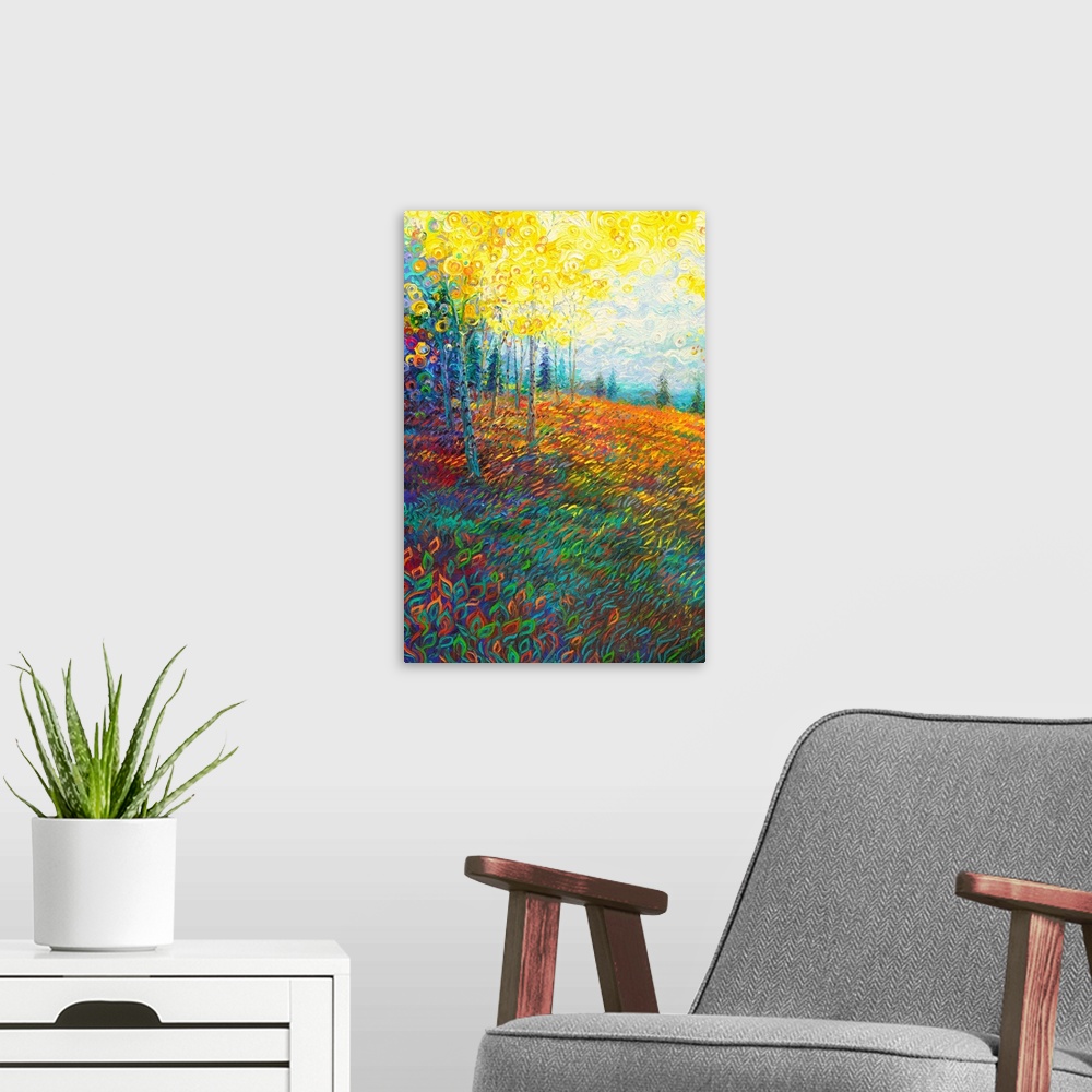 A modern room featuring Brightly colored contemporary artwork of a landscape of trees in a field.
