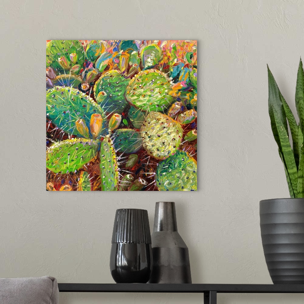 A modern room featuring Brightly colored contemporary artwork of cacti in color.