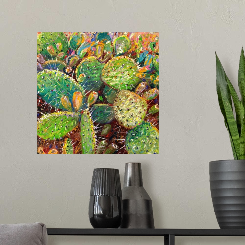 A modern room featuring Brightly colored contemporary artwork of cacti in color.