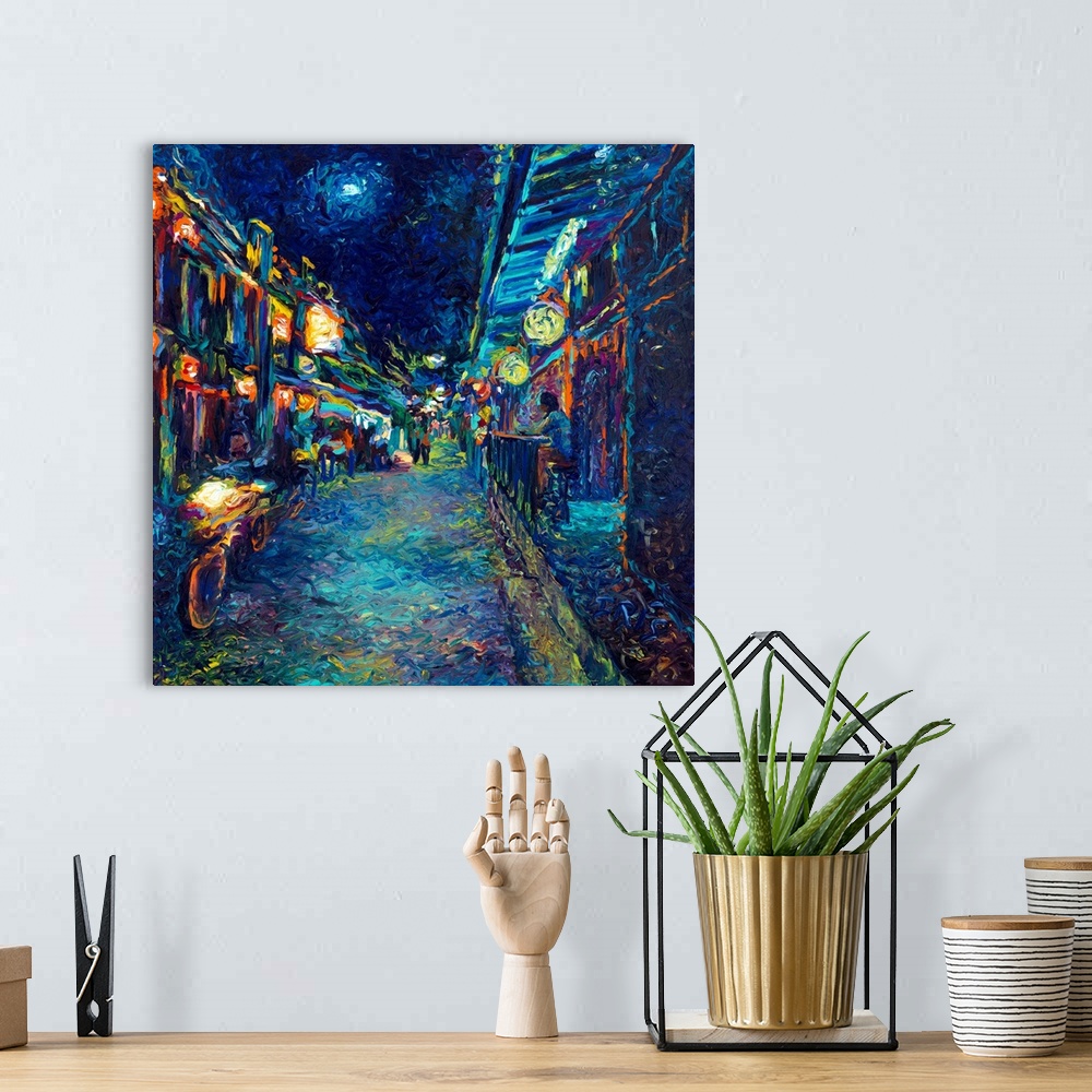 A bohemian room featuring Brightly colored contemporary artwork of an alley view street.