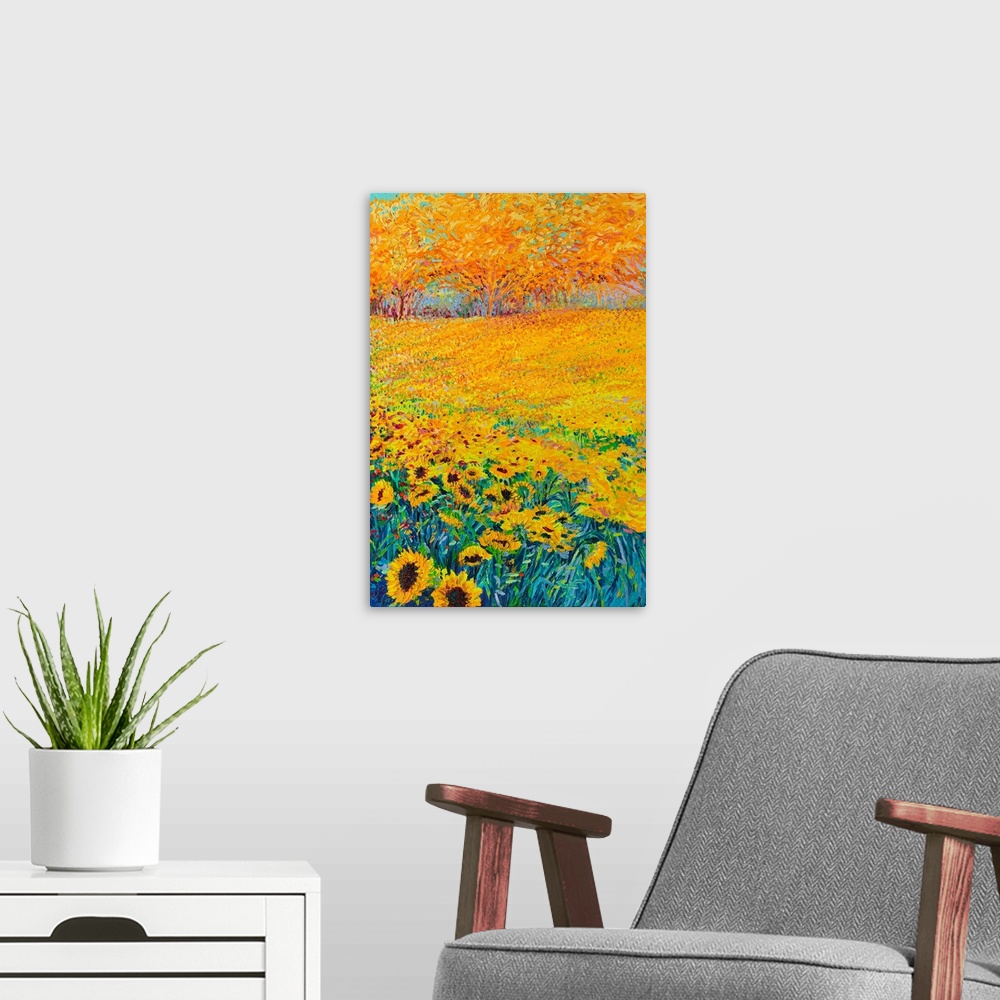 A modern room featuring Brightly colored contemporary artwork of a field of sunflowers.
