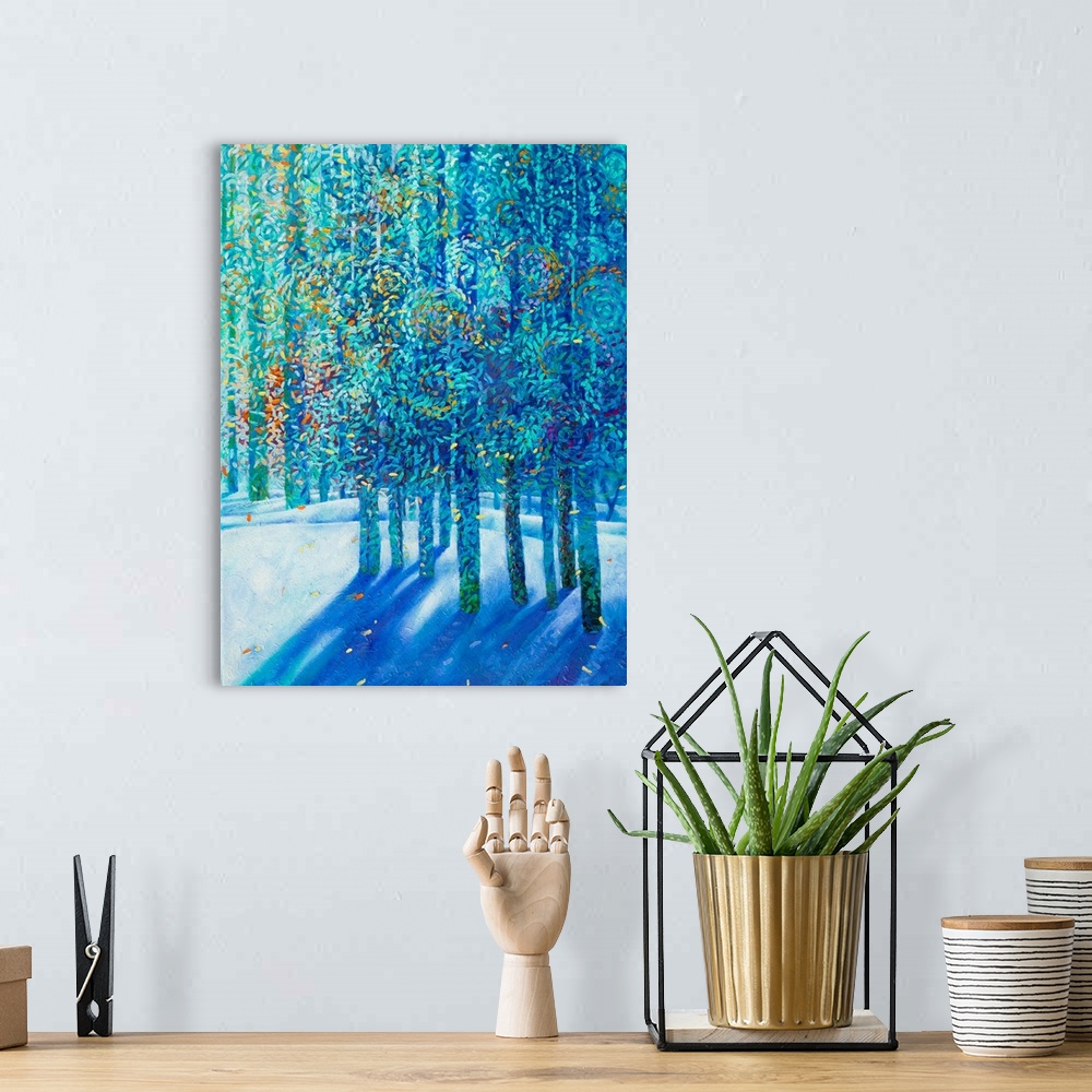 A bohemian room featuring Brightly colored contemporary artwork of blue trees in the snow.