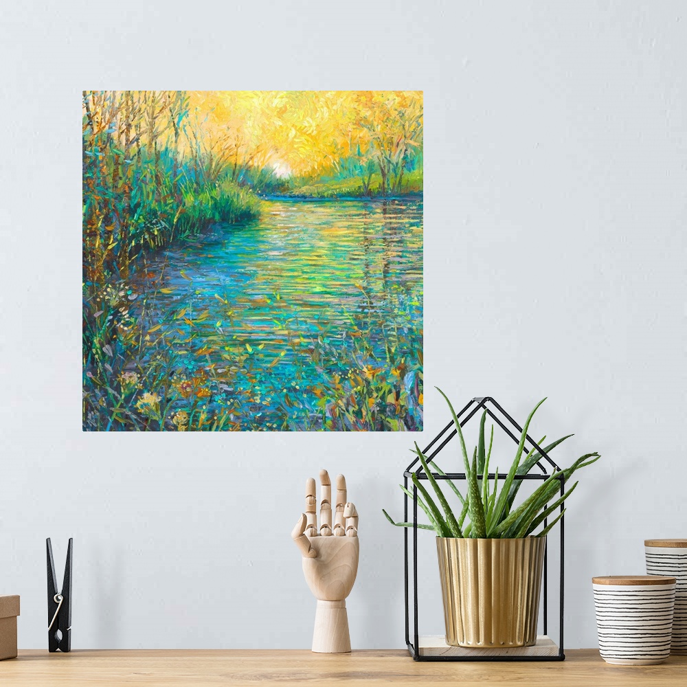 A bohemian room featuring Brightly colored contemporary artwork of a landscape with a lake and foliage.