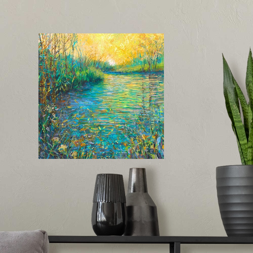A modern room featuring Brightly colored contemporary artwork of a landscape with a lake and foliage.