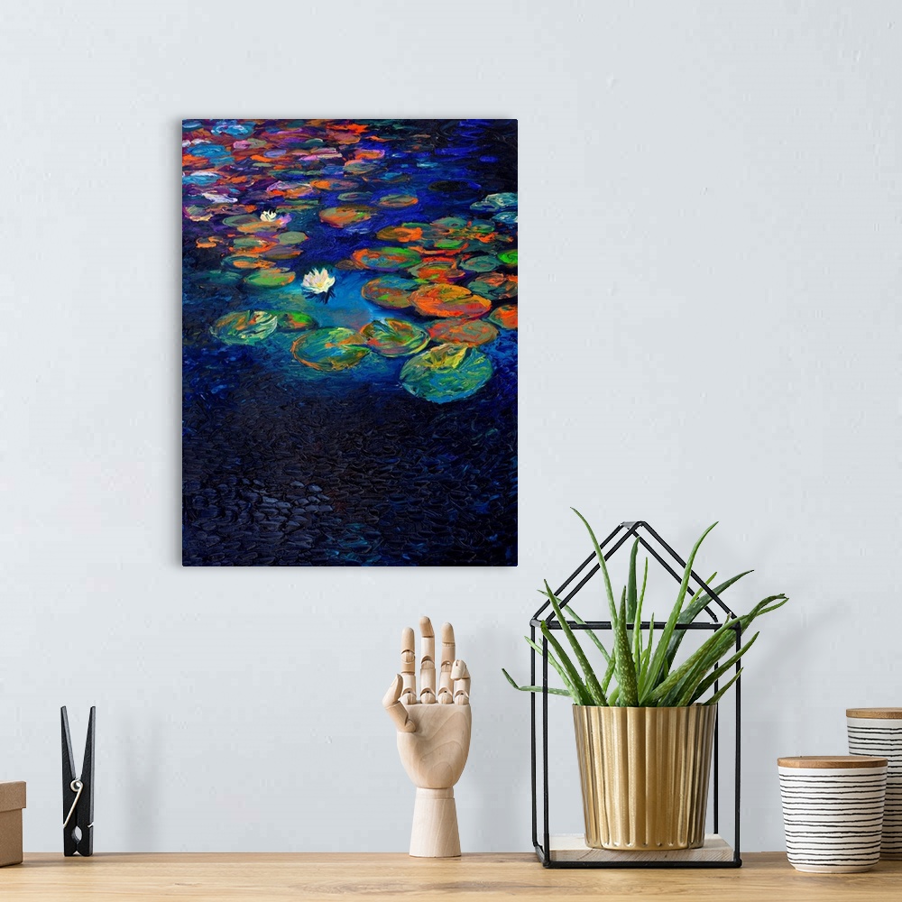 A bohemian room featuring Brightly colored contemporary artwork of a single lotus flower floating in dark water.