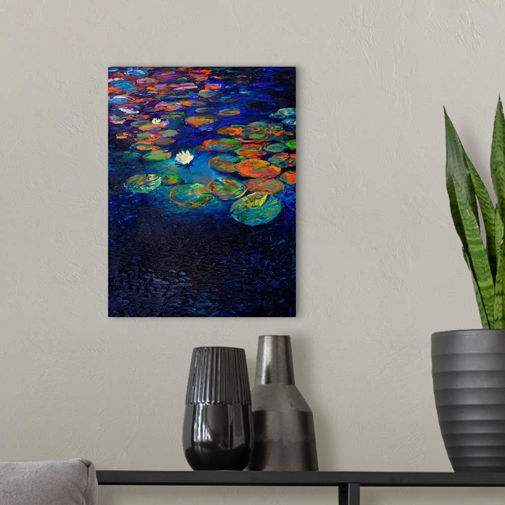 A modern room featuring Brightly colored contemporary artwork of a single lotus flower floating in dark water.