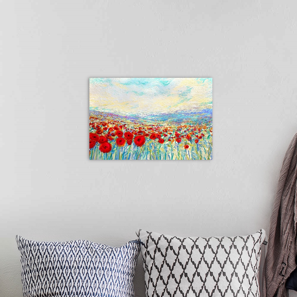 A bohemian room featuring Brightly colored contemporary artwork of a painting of a field of red poppies.