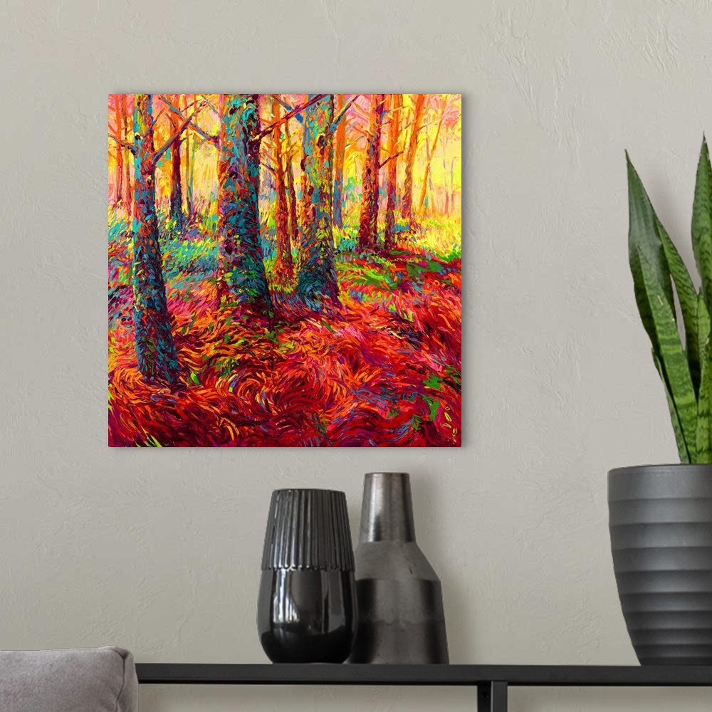 A modern room featuring Brightly colored contemporary artwork of a forest of redwoods in red.