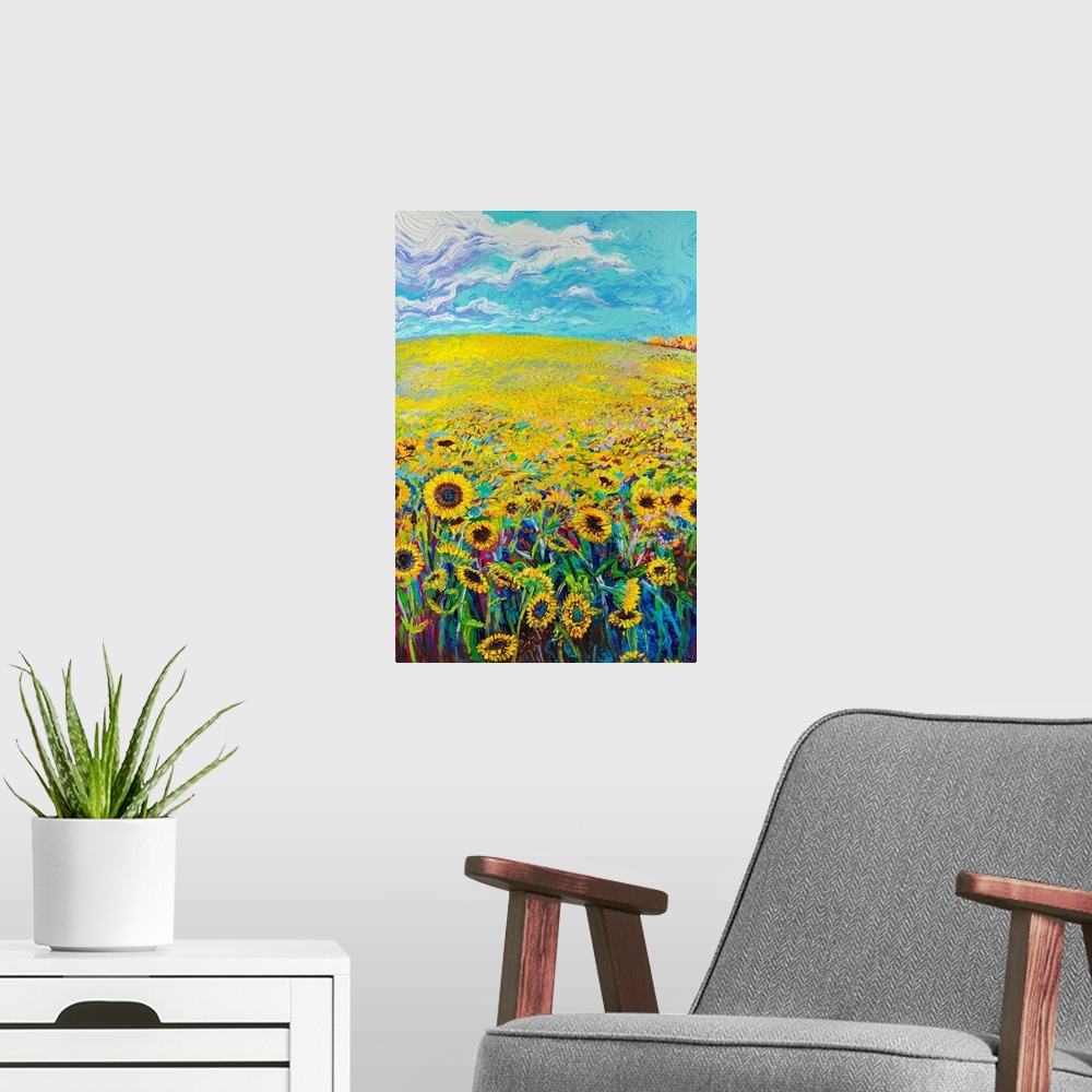 A modern room featuring Brightly colored triptych of a sunflower field. Panel 1 of 3.
