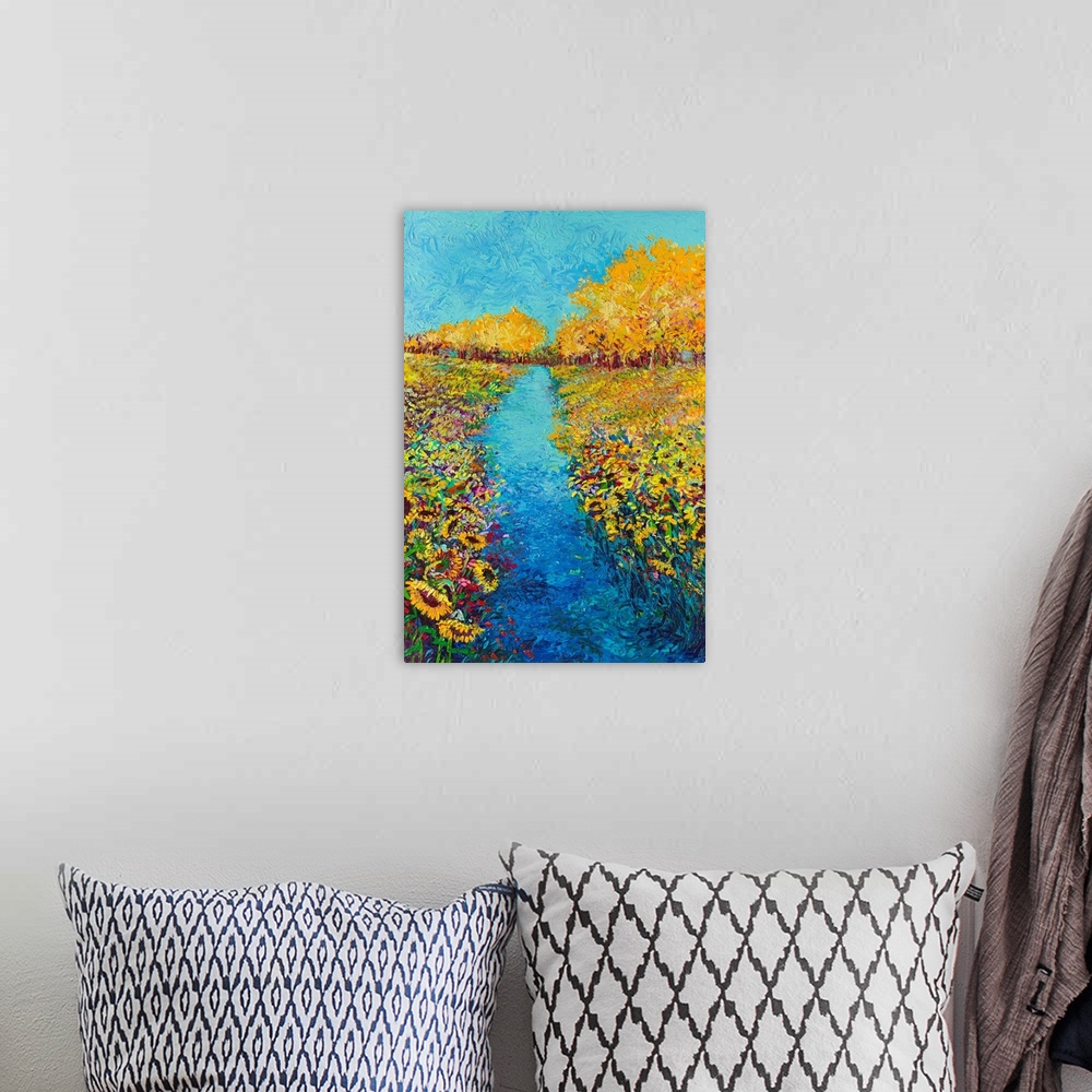 A bohemian room featuring Brightly colored triptych of a sunflower field. Panel 2 of 3.