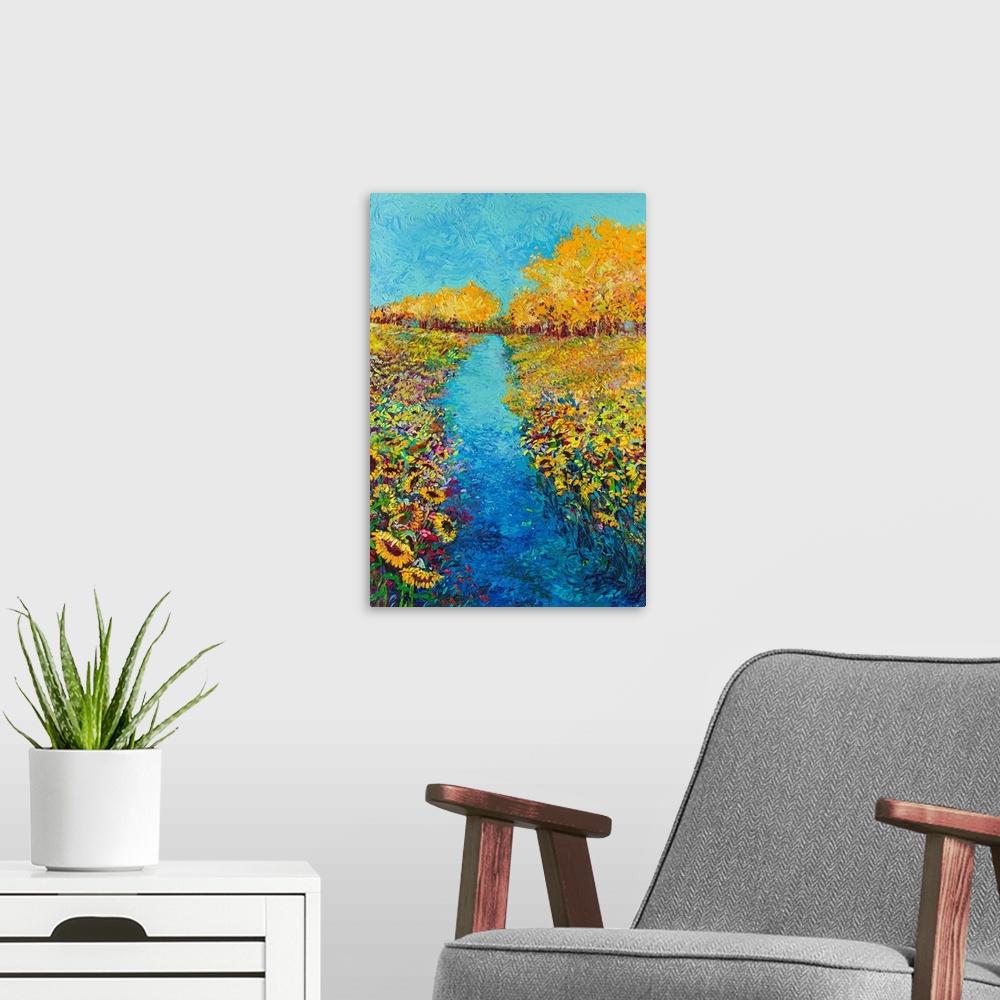 A modern room featuring Brightly colored triptych of a sunflower field. Panel 2 of 3.